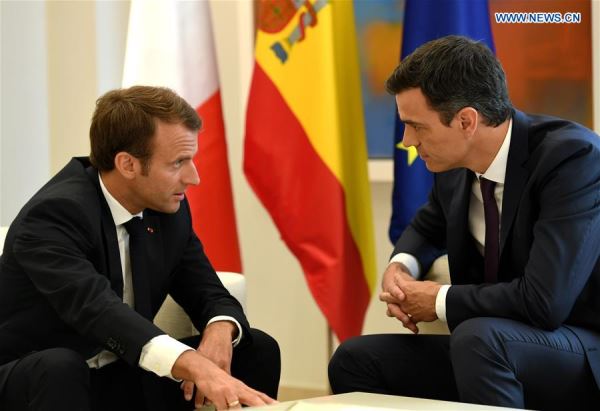 Spanish Prime Minister Pedro Sanchez (R) meets with French President Emmanuel Macron in Madrid, Spain on July 26, 2018. [File photo: Xinhua]